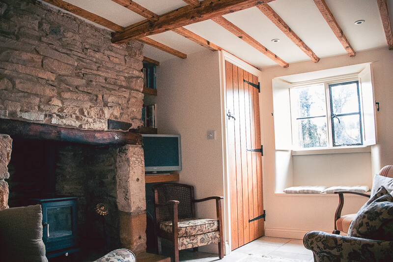 The cottage's historic beams had been hidden. As part of the internal alterations these were exposed to make a feature piece of this second living area.