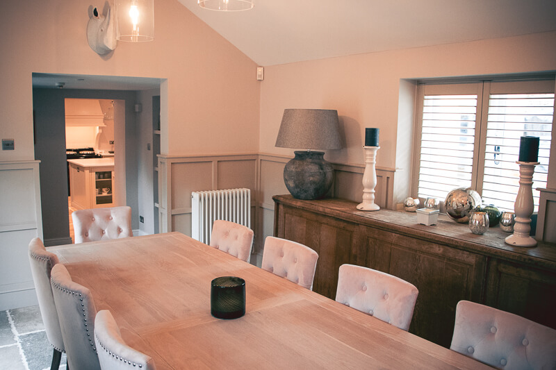 Newly clad paneled walls in dining room created by our joinery company